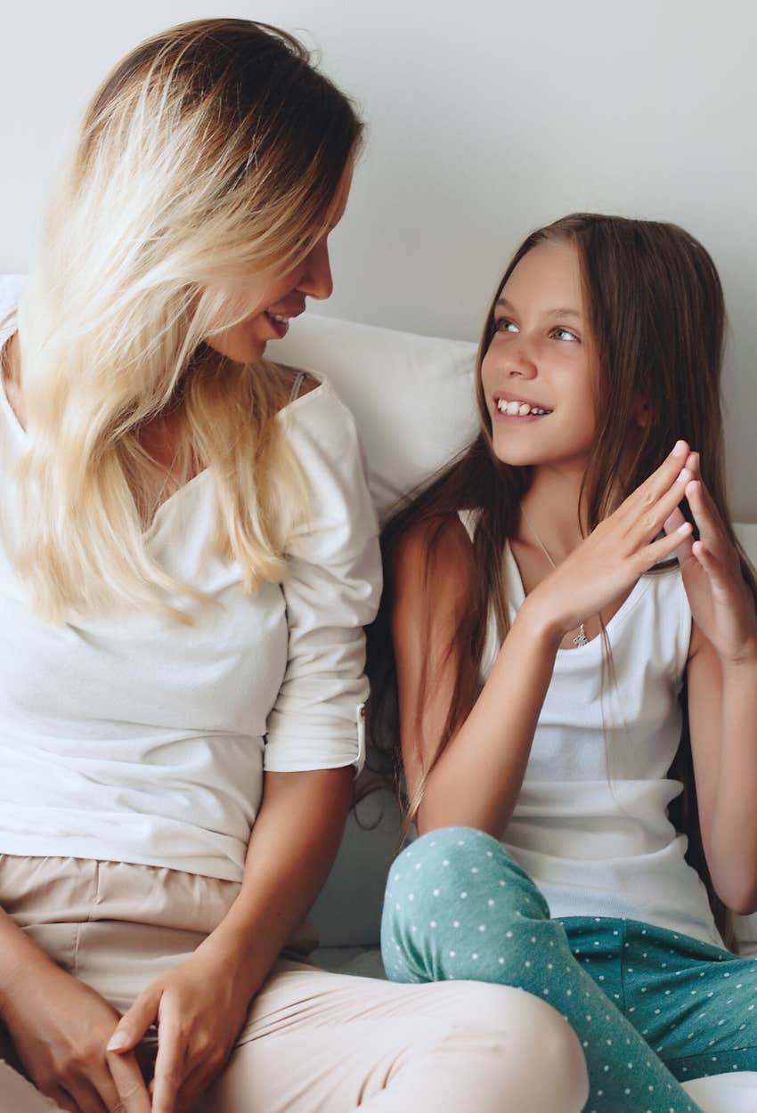 mom and tween daughter talking about keeping her apartment clean