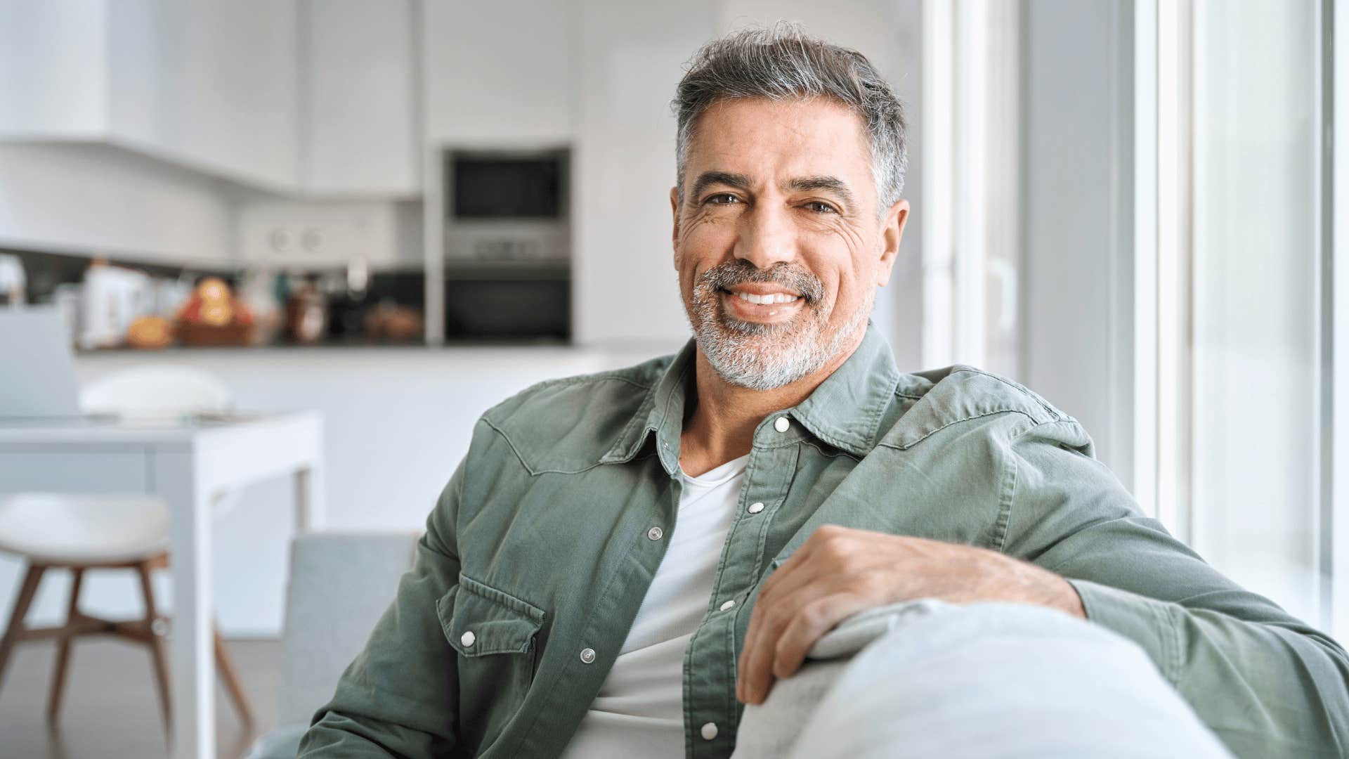 smiling man with a beard