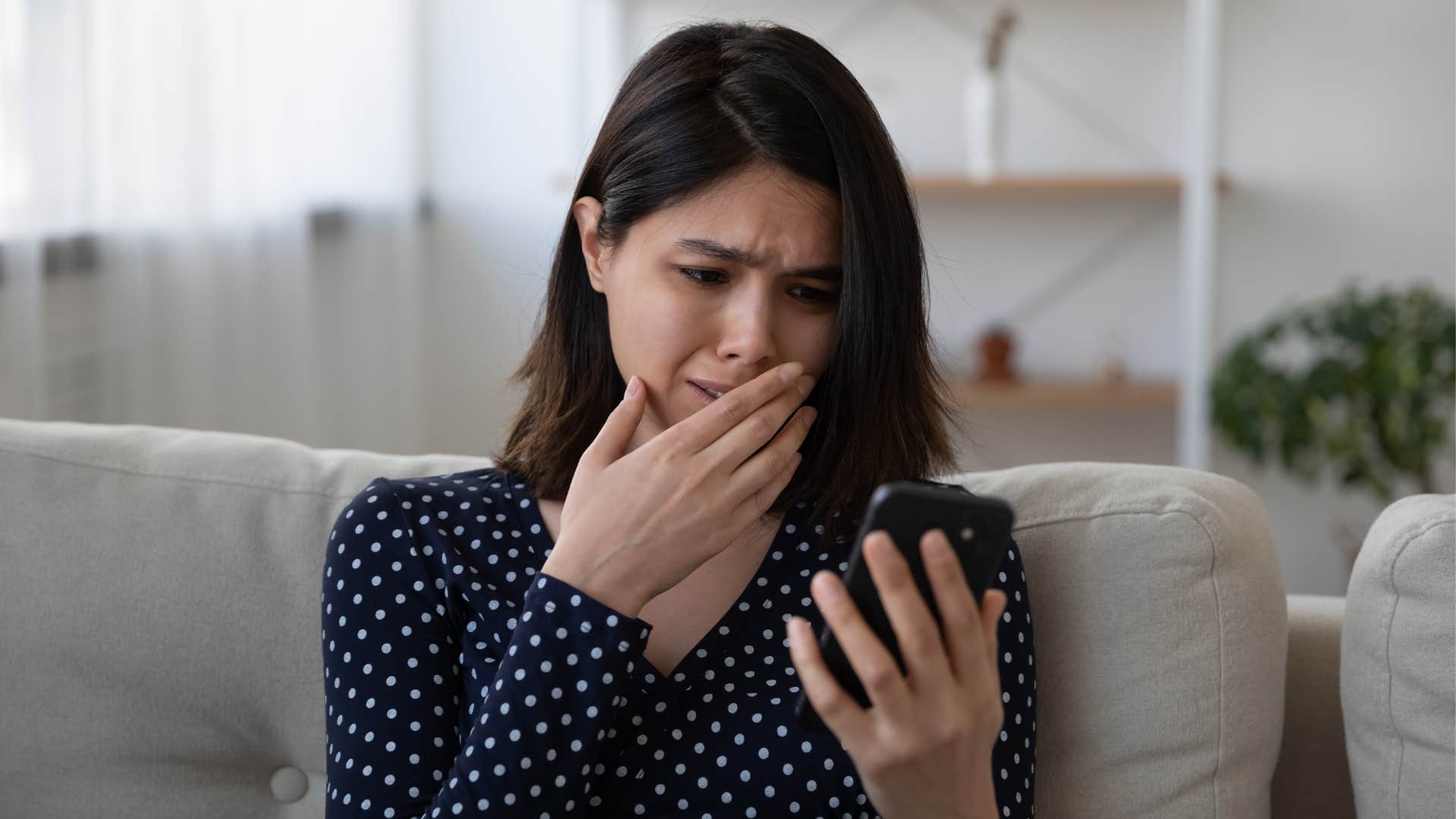 Woman, phone, sad, desperate