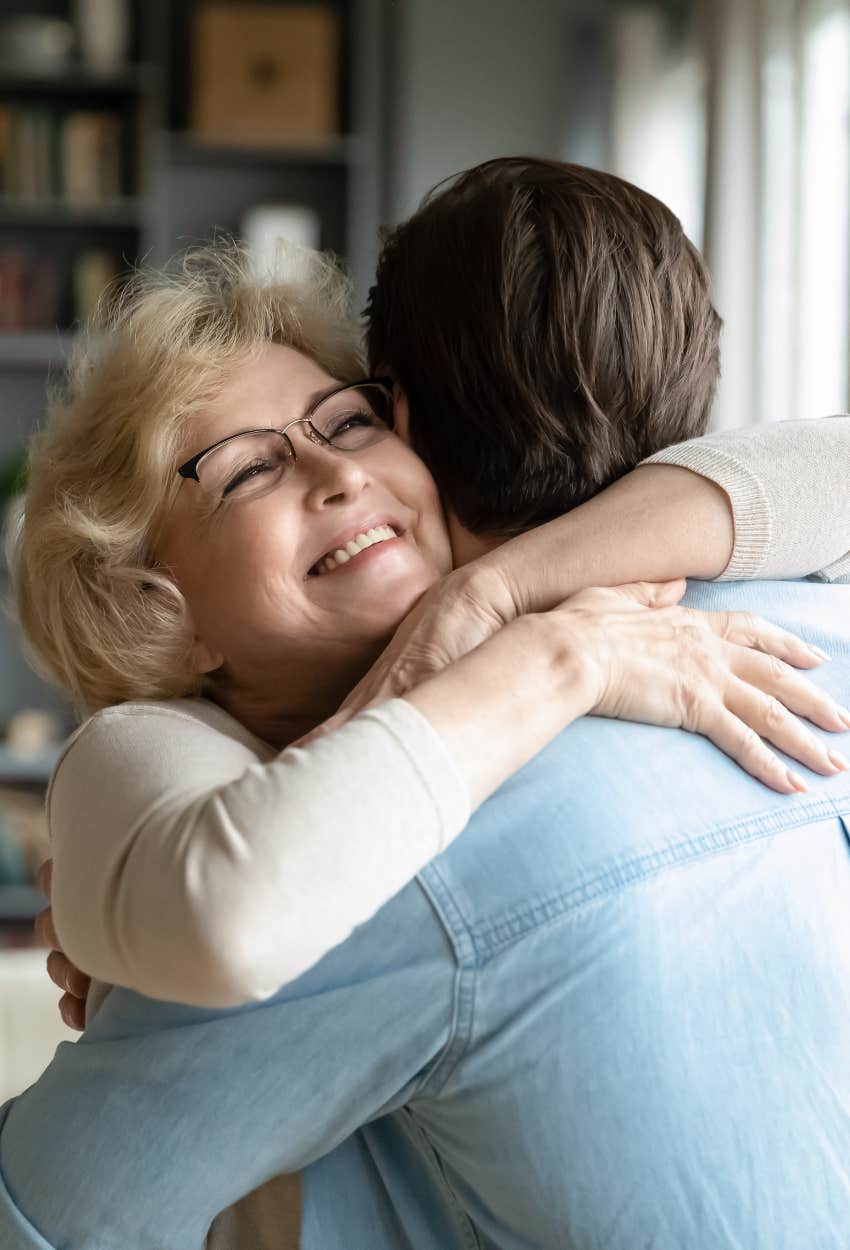 Man showing affection to his mom