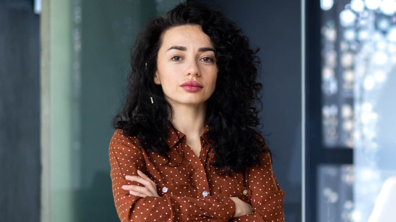 woman standing with arms crossed