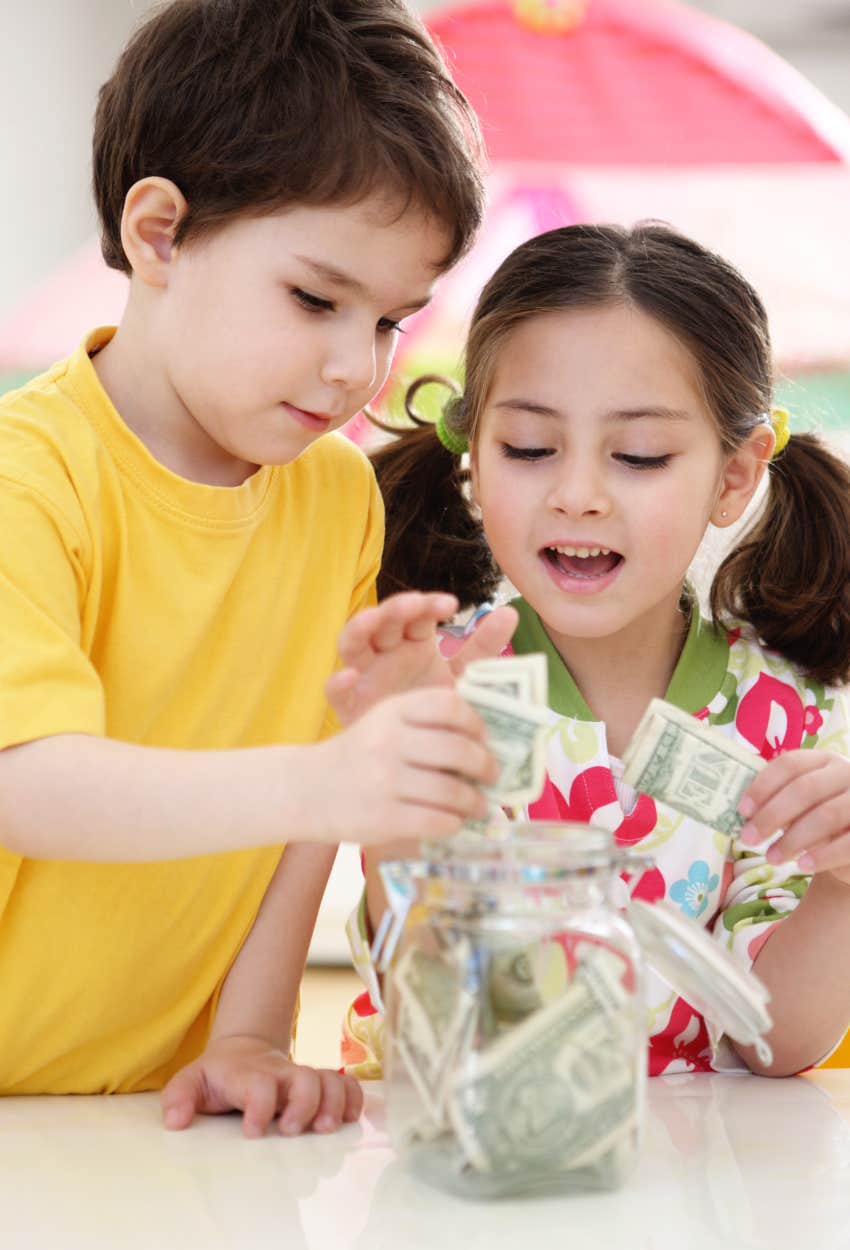 Two young kids learning financial literacy