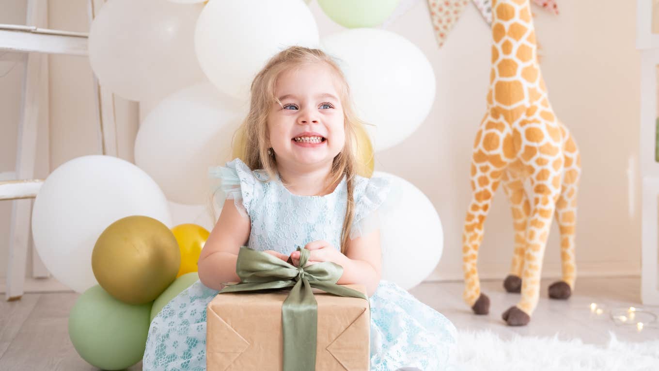 Little girl celebrating her birthday with strict gift rules