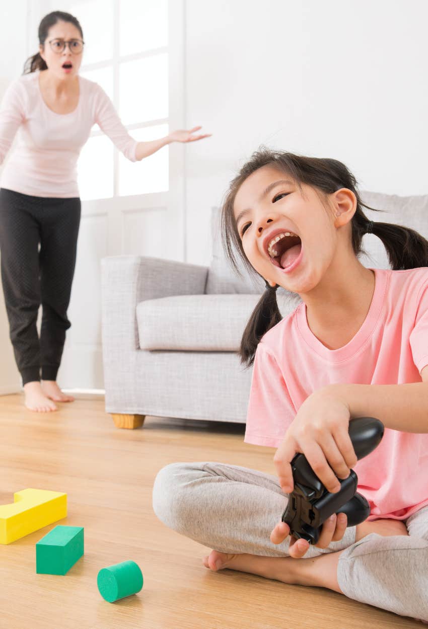 mom getting mad at daughter playing video games