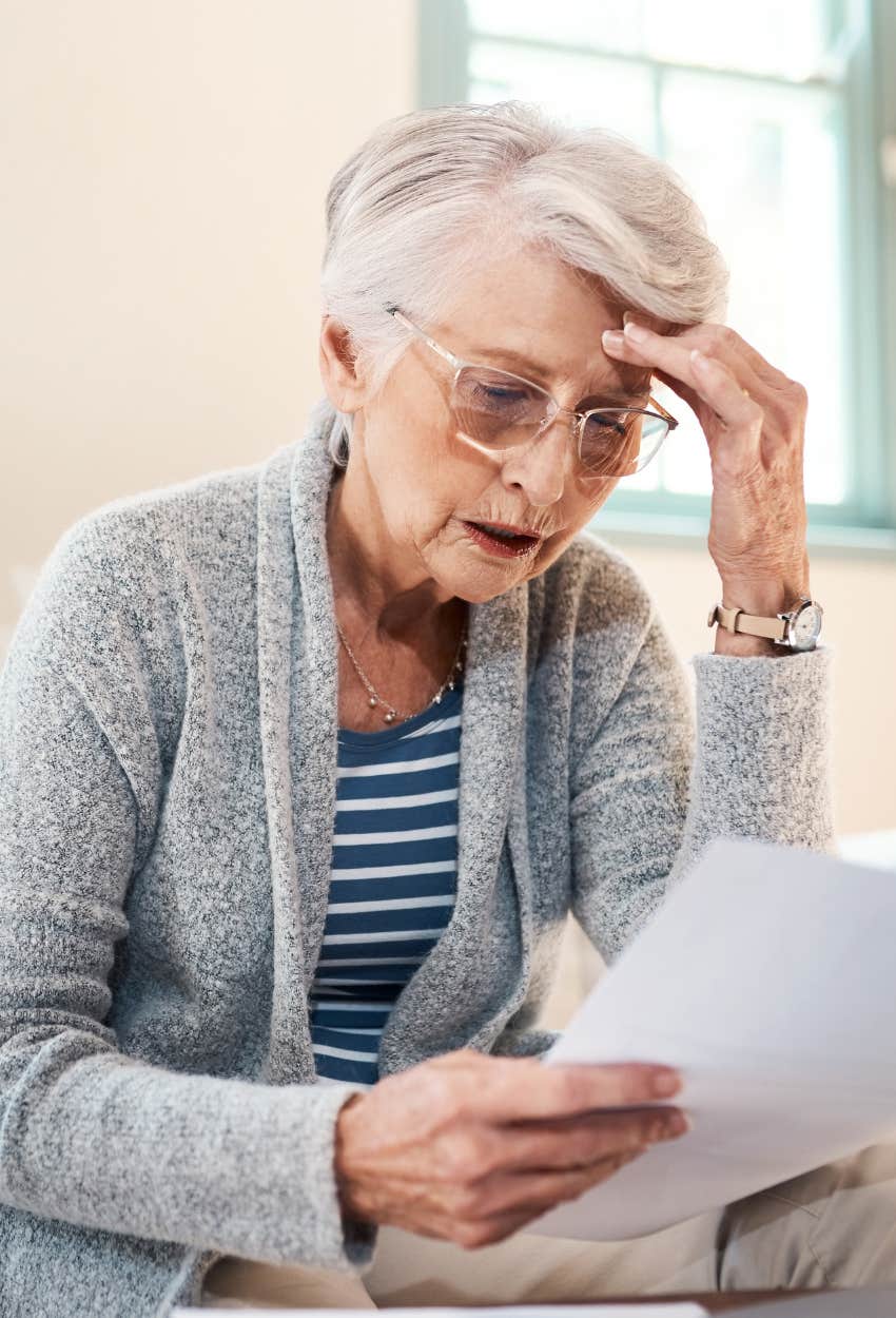 Woman feeling stressed because she doesn't have enough money saved for retirement