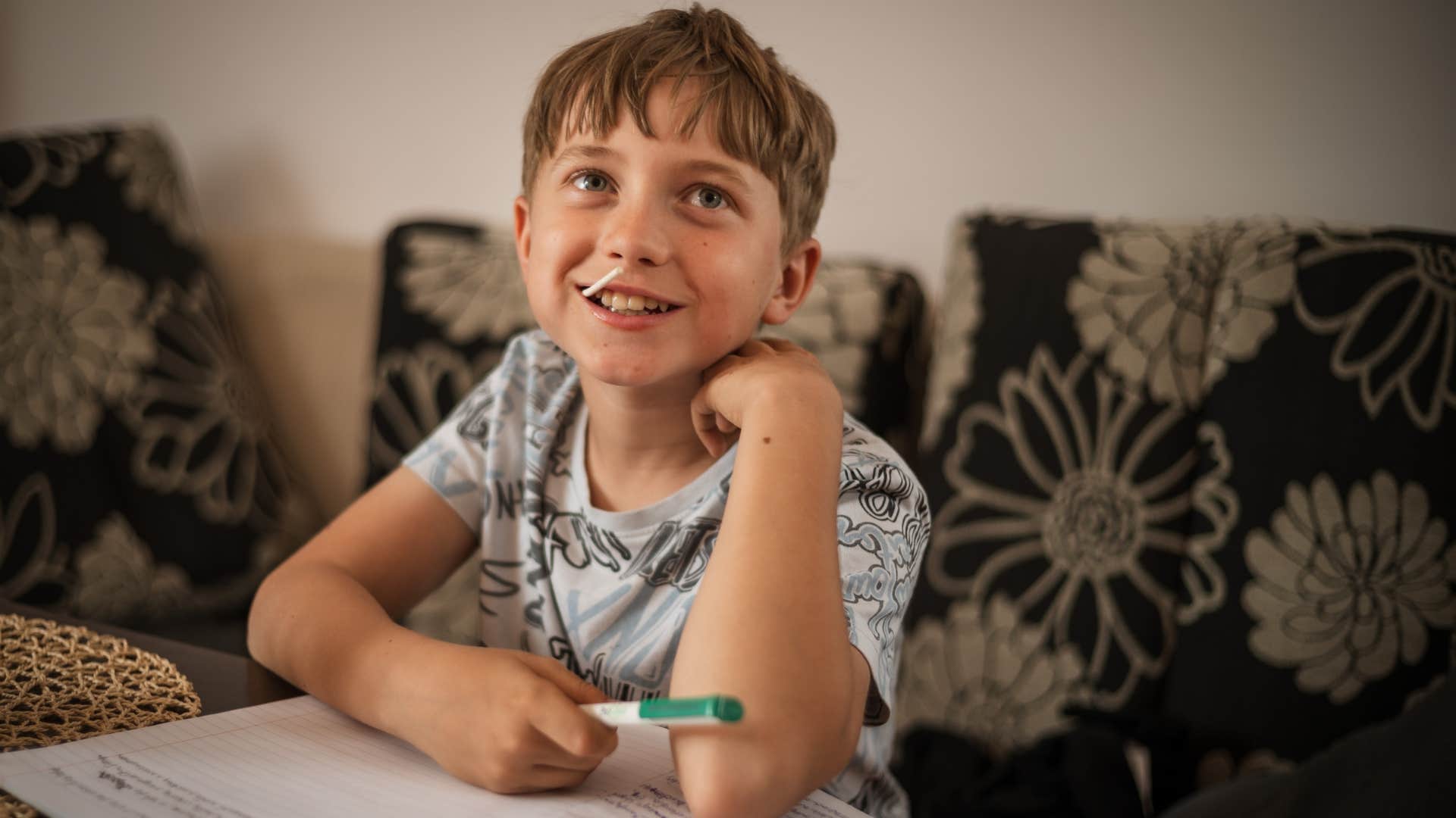 Smiling boy with a lollipop Perfect grades were never demanded