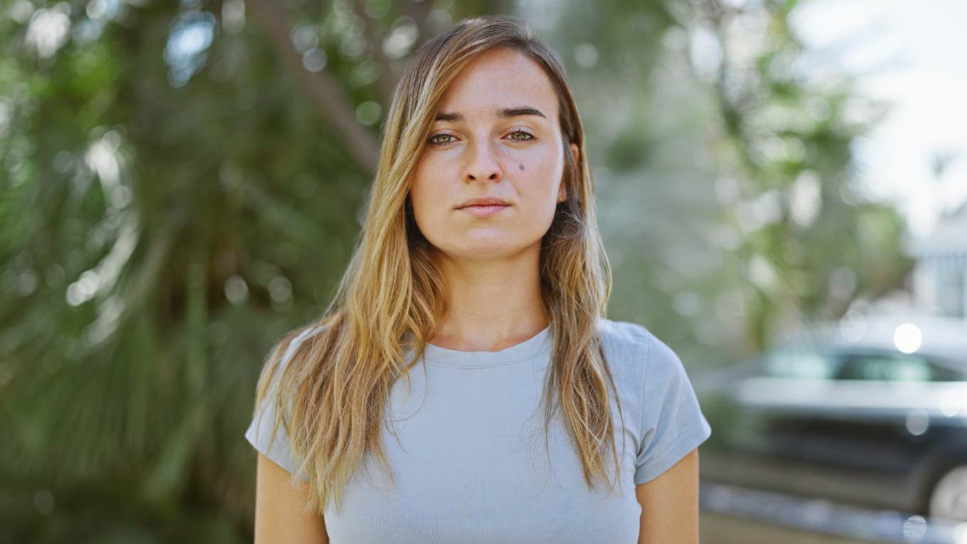 Young woman looking serious because she had no control over her emotions from birth control 