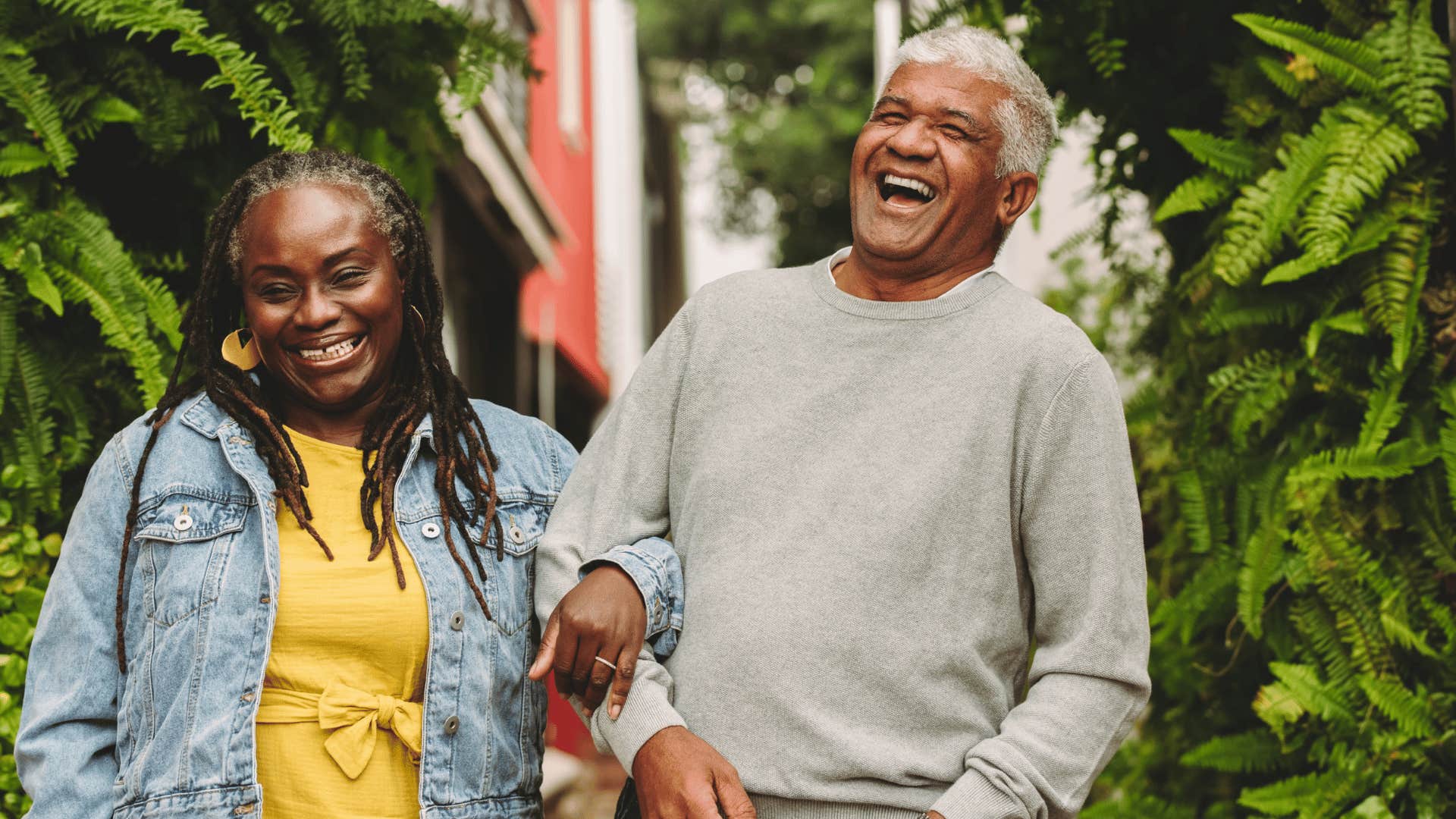 couple walking side by side smiling