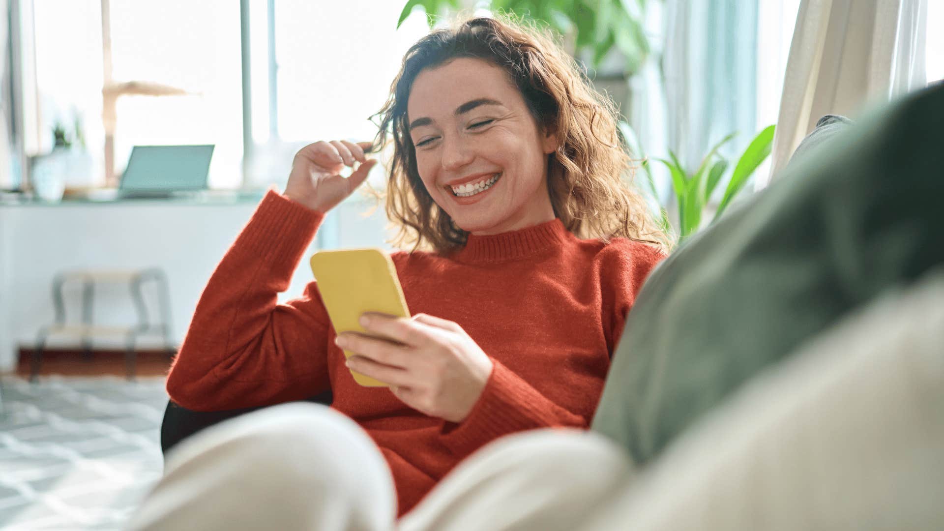 woman not getting annoyed because she's not answering her phone