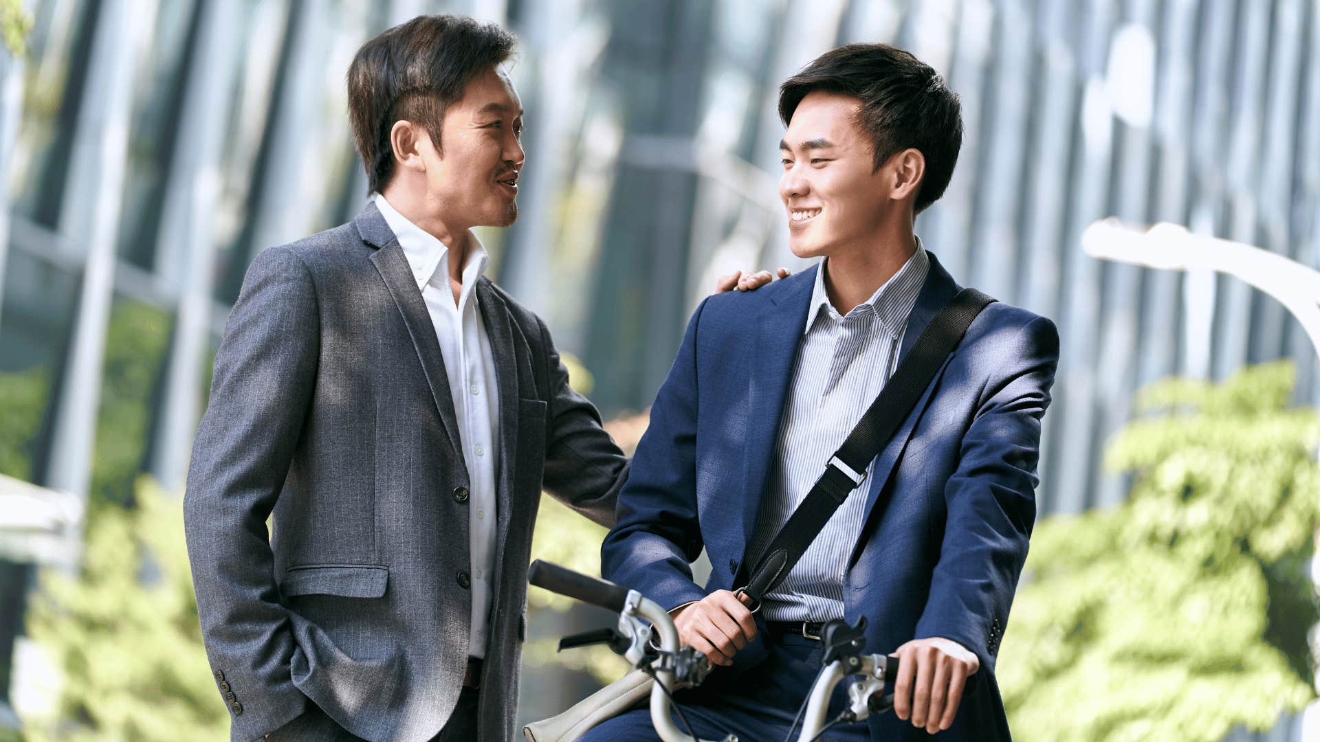 two men chatting while outside