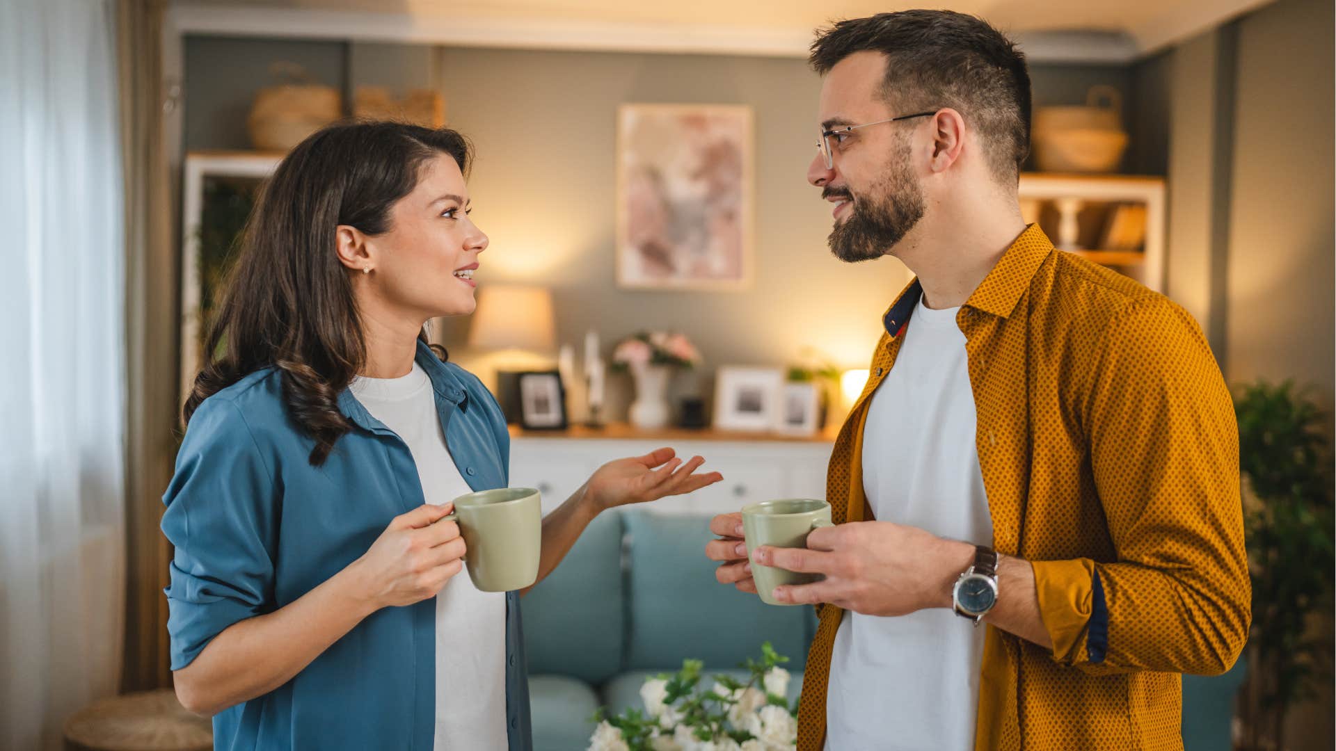 Couple smiling and talking to each other.