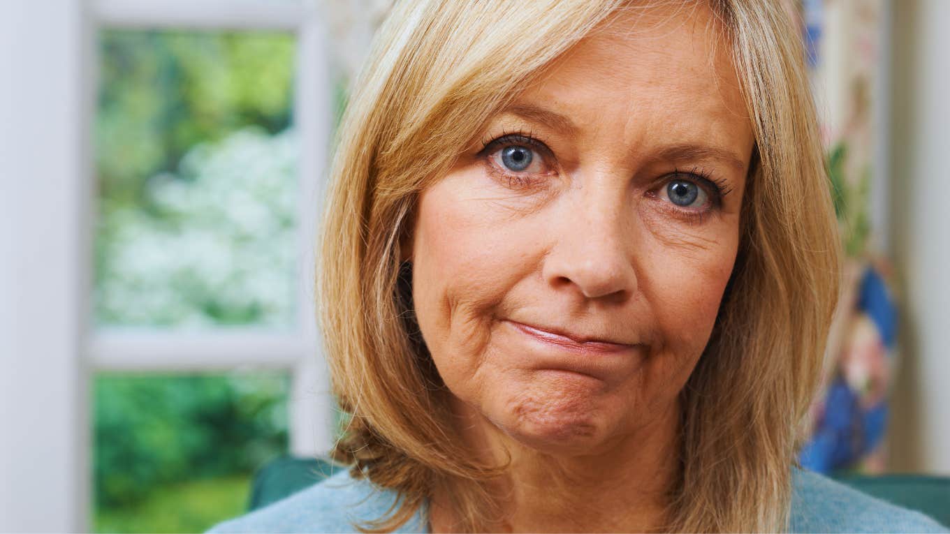 Portrait Of Unhappy Mature Woman At Home