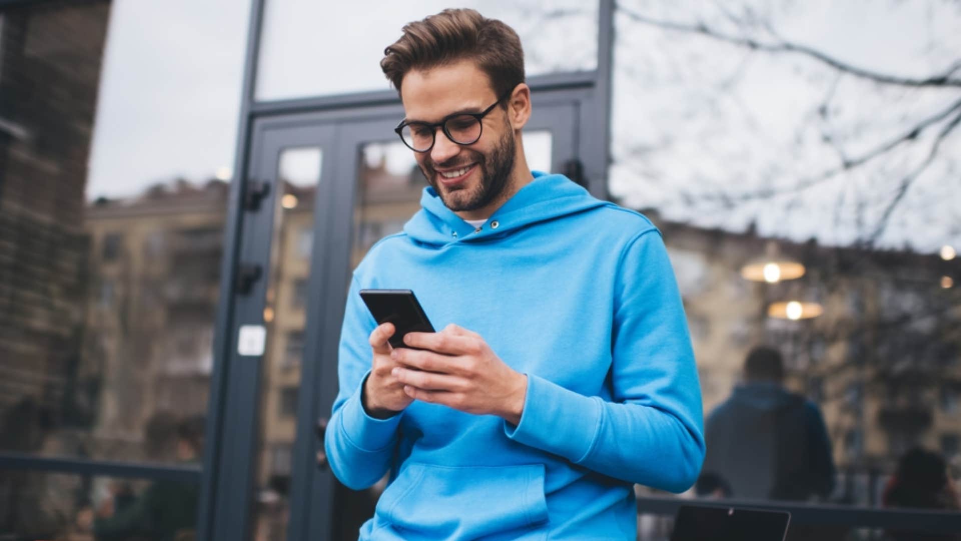 millennial man checking his social media followers