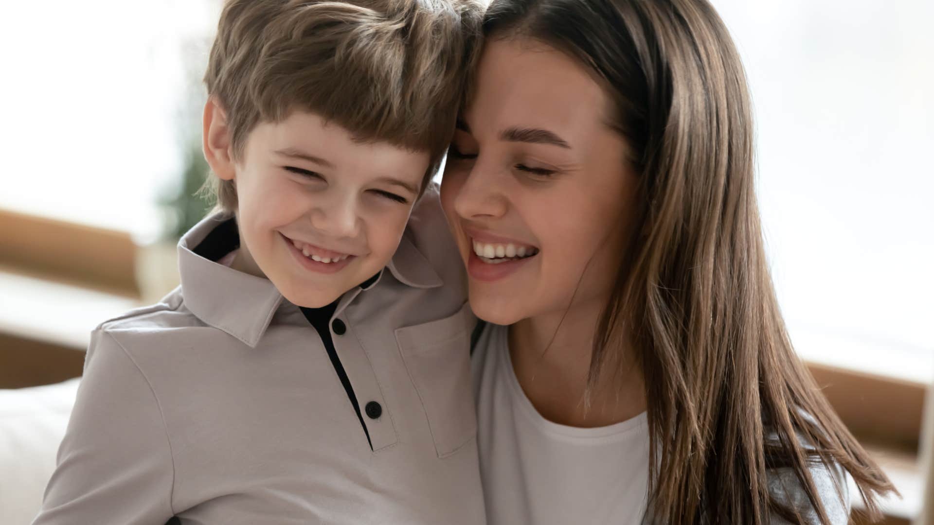 mom hugging son