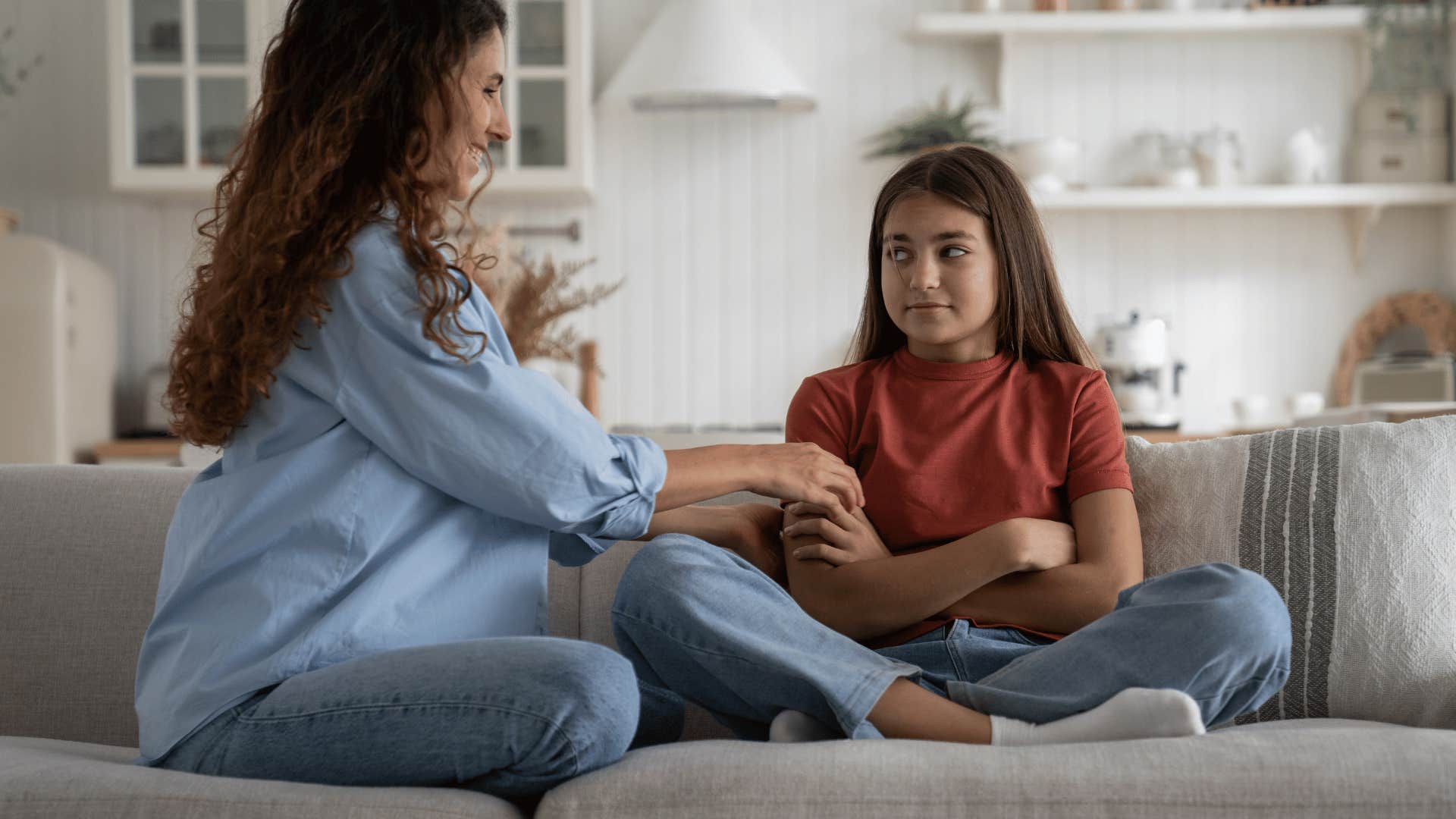 mother talking to daughter