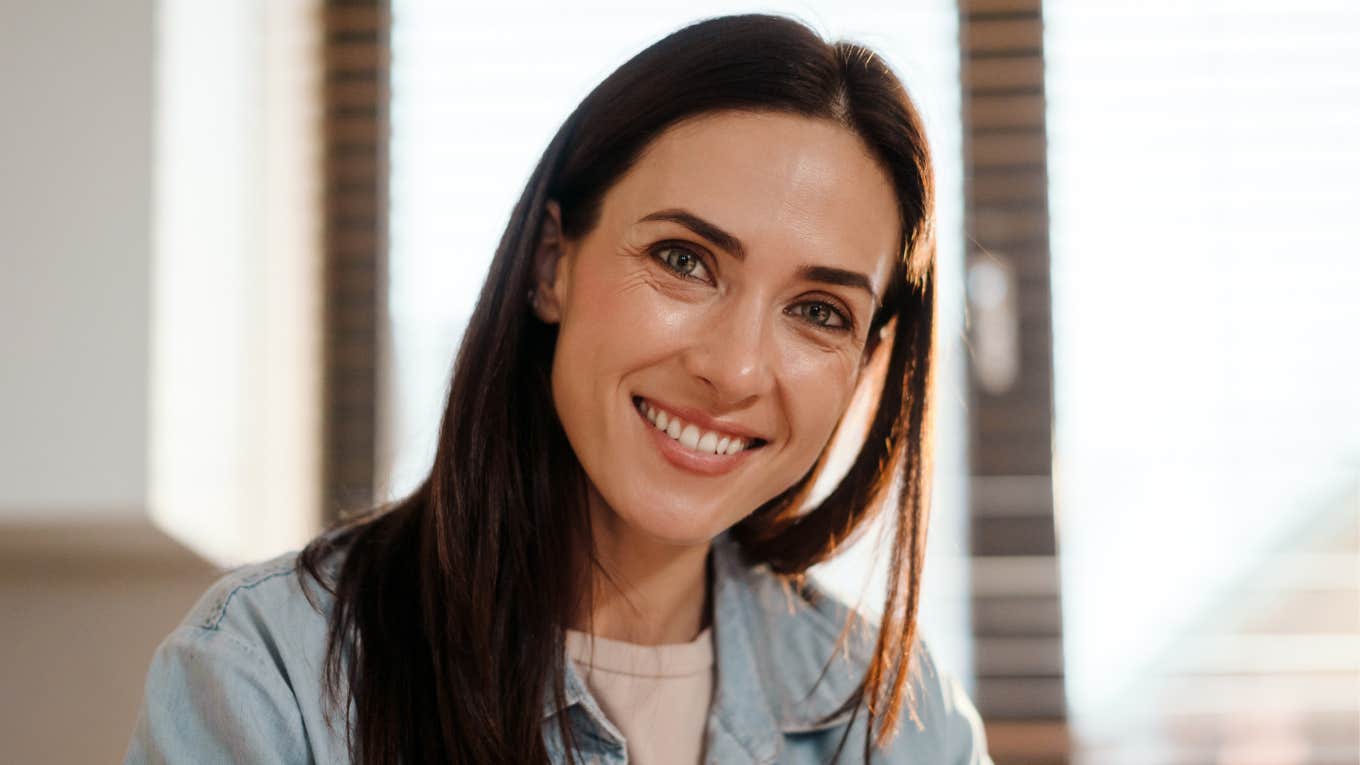 woman smiling wanting to be important