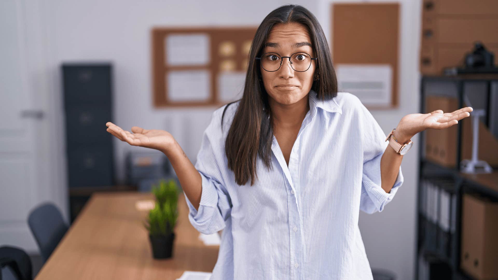 woman shrugging her shoulders