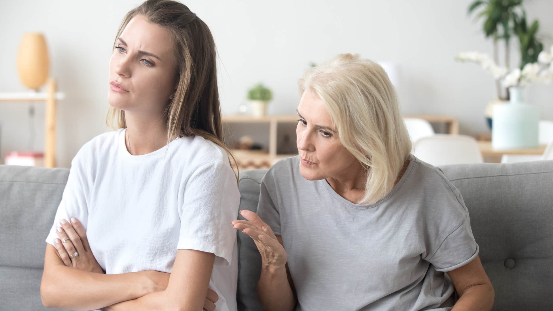 mother arguing with her disengaged adult daughter