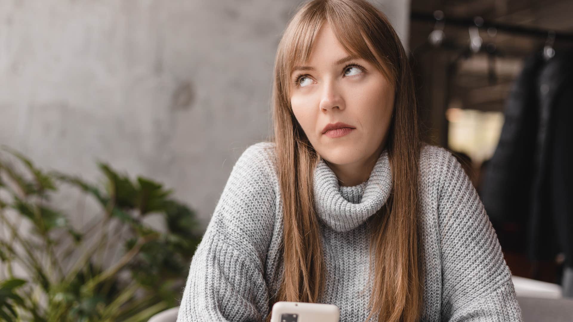 annoyed woman rolling her eyes