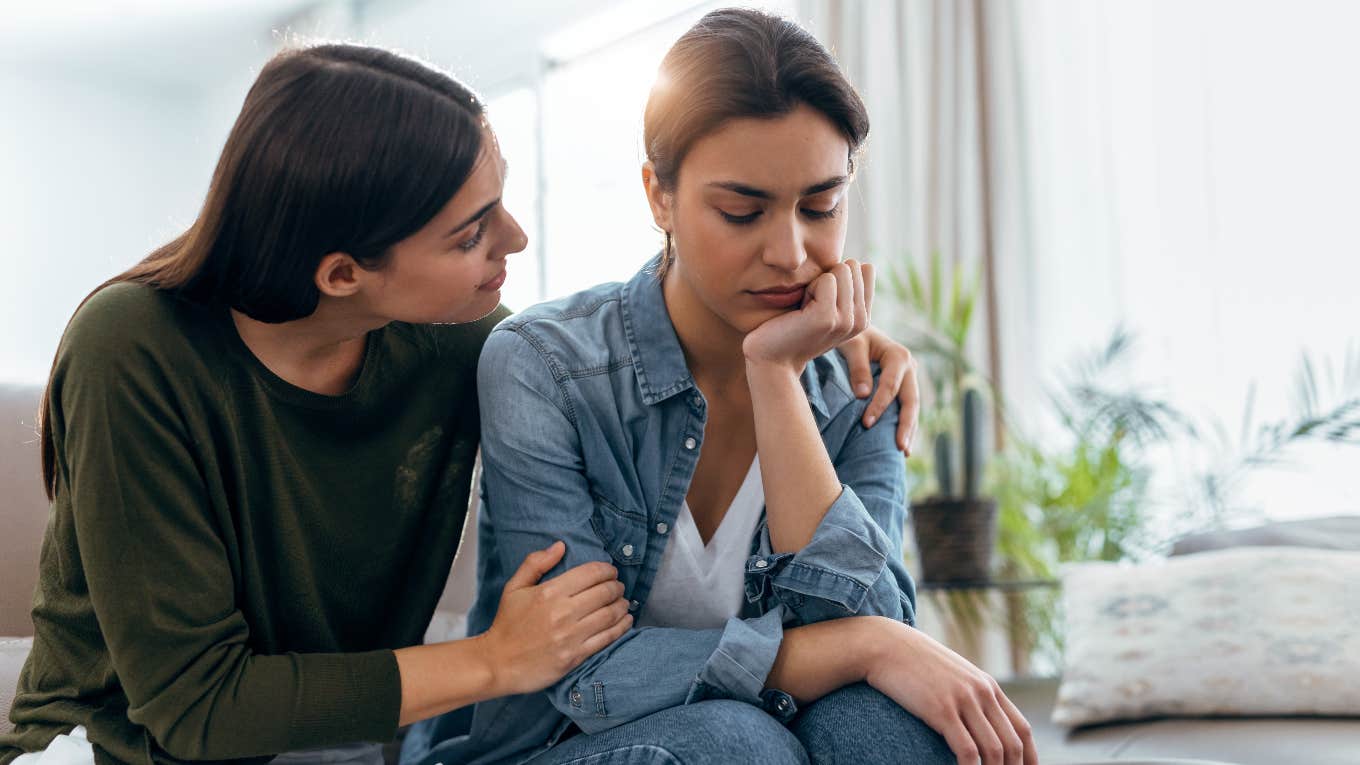 Woman comforting her friend going through hard times