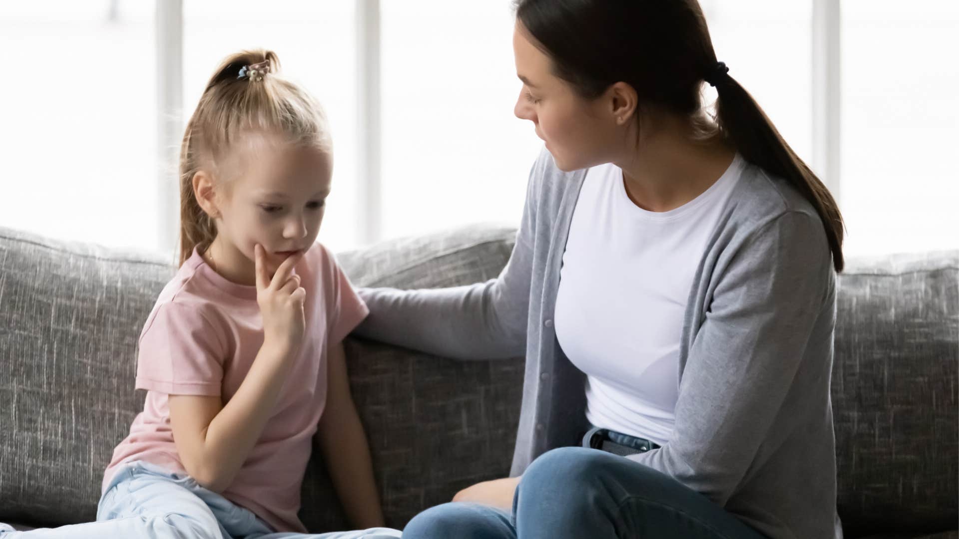 A mother tells her young daughter that she loves her but