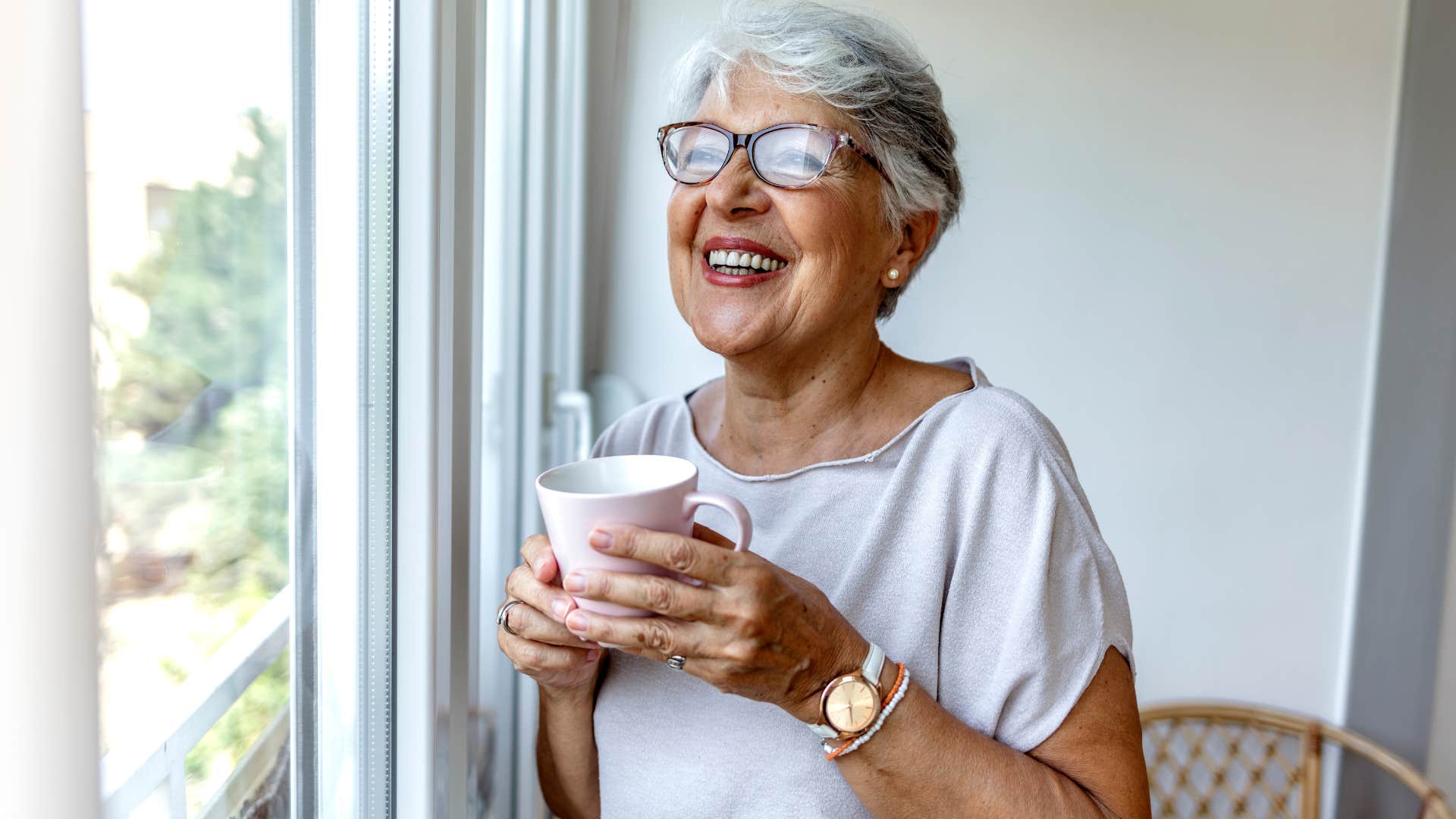 older woman smiling thinking about life