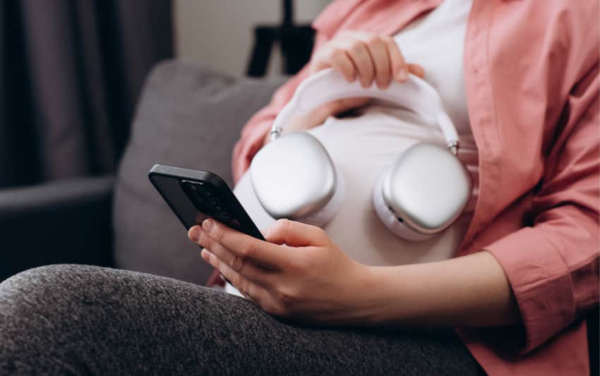 Pregnant woman plays classical music for her unborn baby.