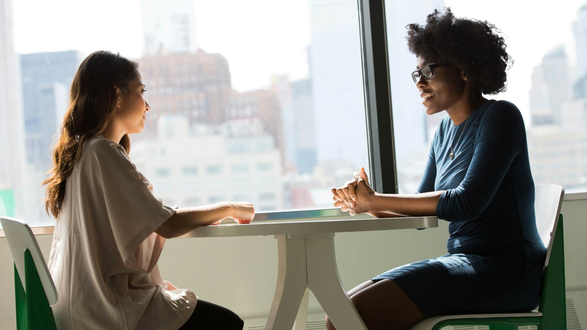 two women talking using psychological trick gain control staying silent