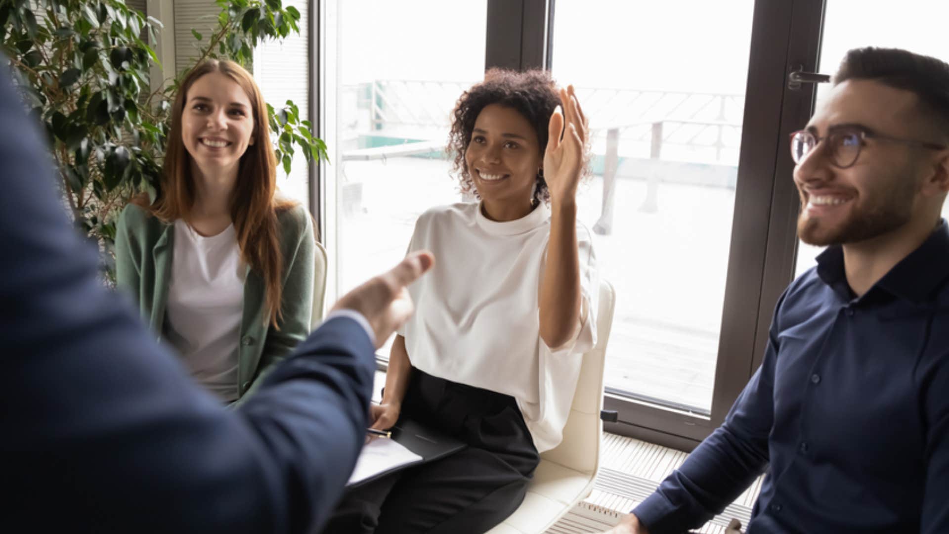 woman speaking up in meeting