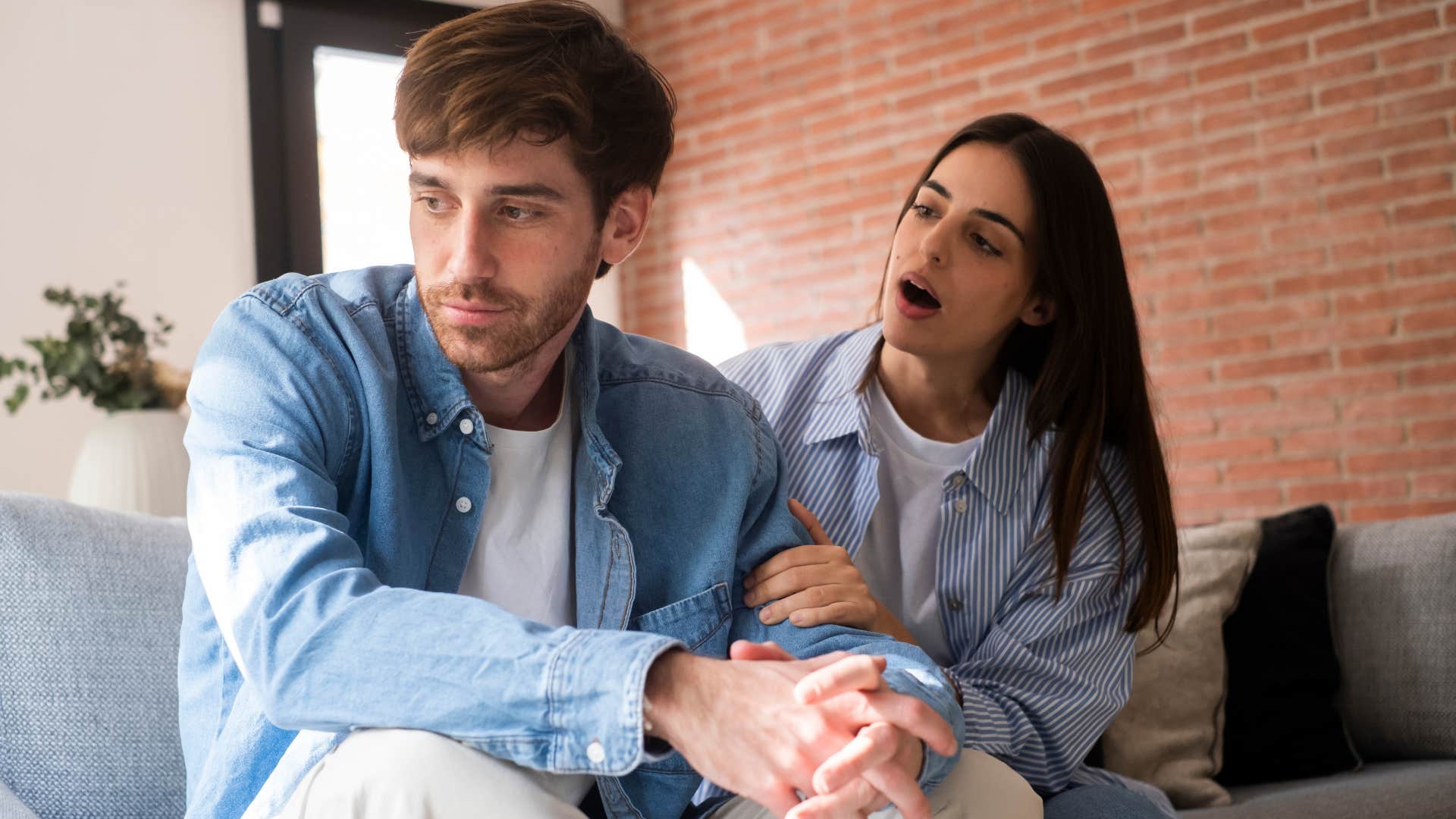 woman arguing with her disengaged husband