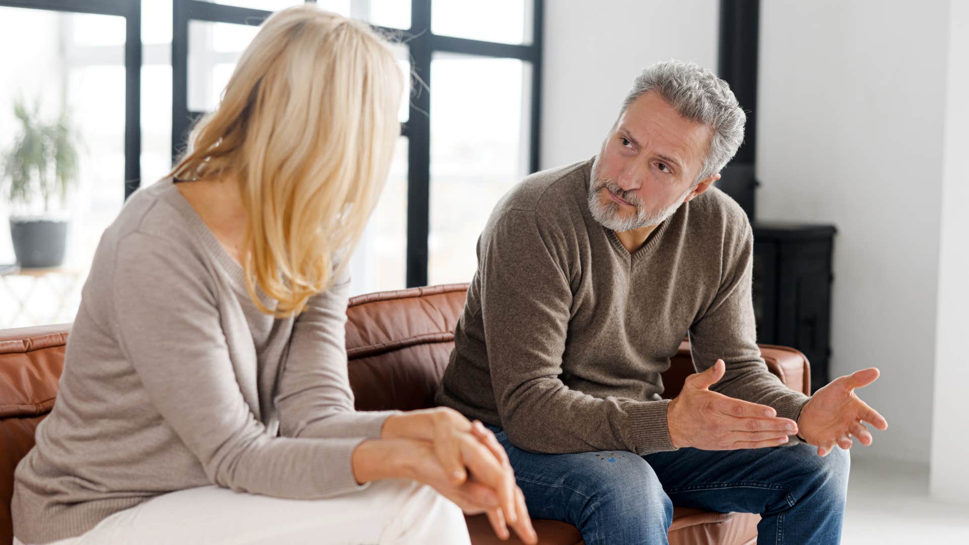 older man arguing with his wife