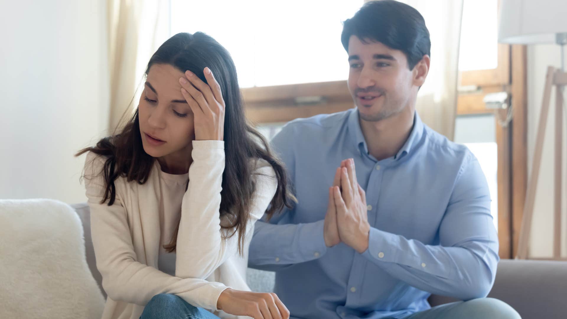 woman struggling to make a choice while husband begs