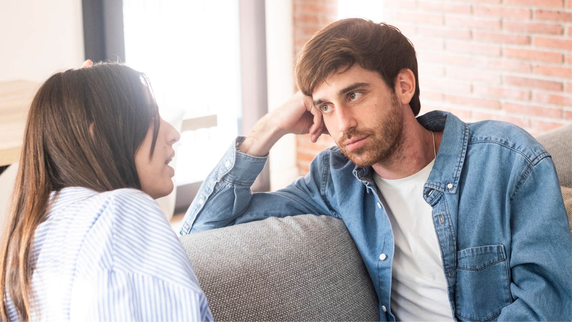 man having trouble focusing on conversation