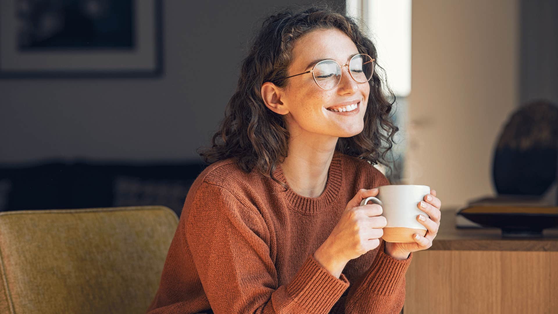 woman having a cup of coffee