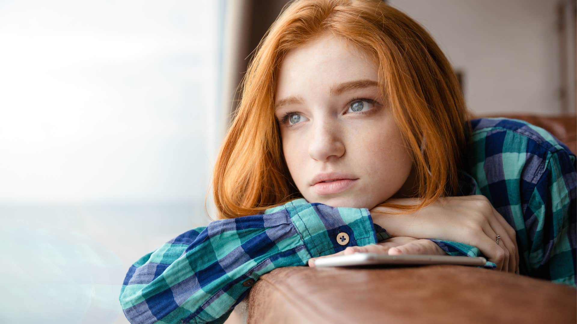 young girl trying to process emotions