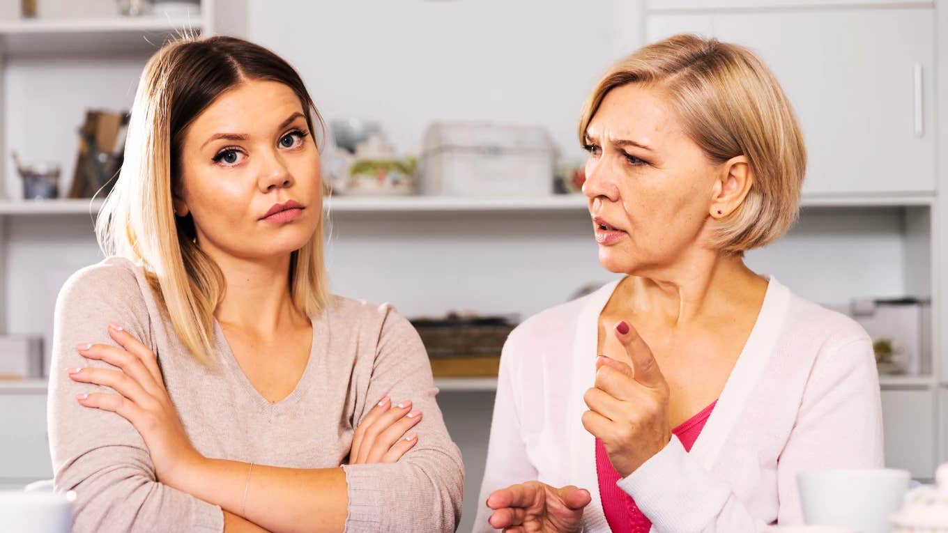 adult woman ignoring bickering mother