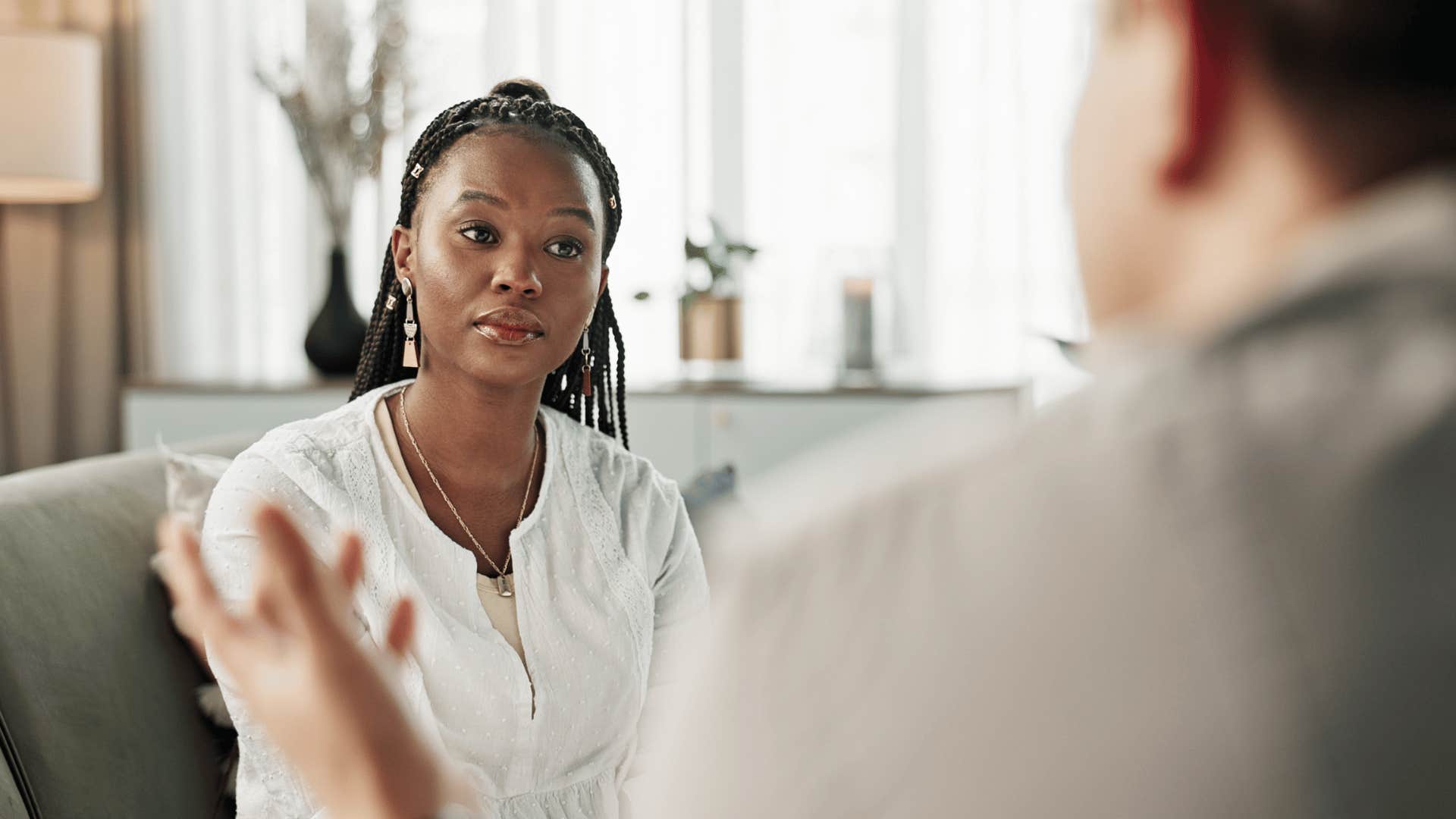 woman talking with upset man