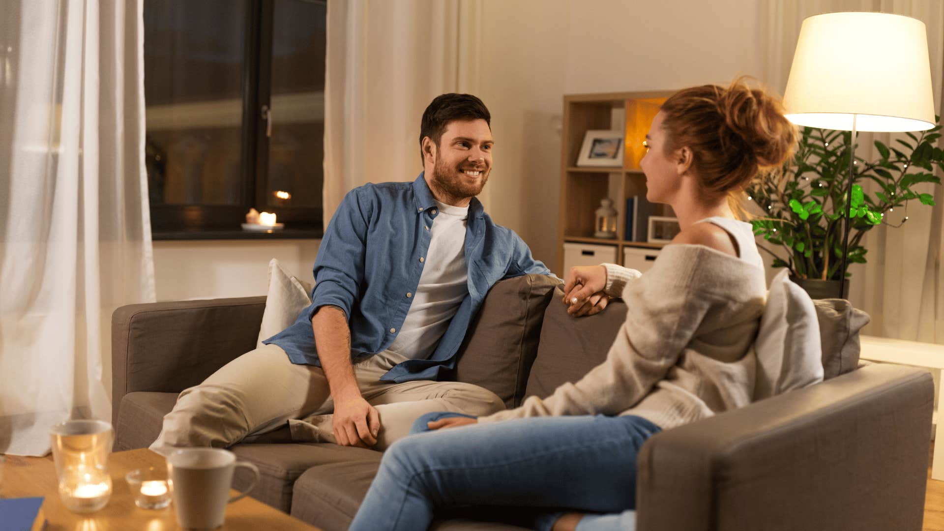 couple talking on couch