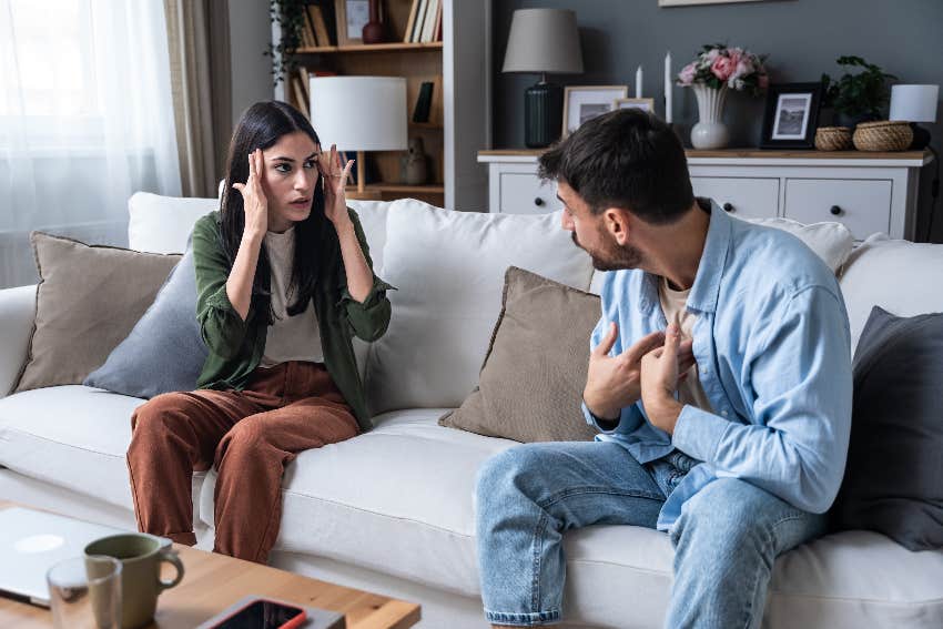 couple arguing on couch