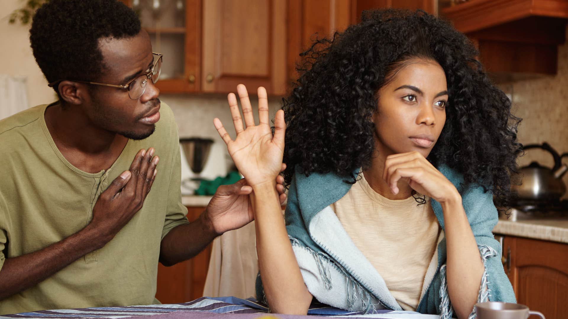 woman not listening to upset husband