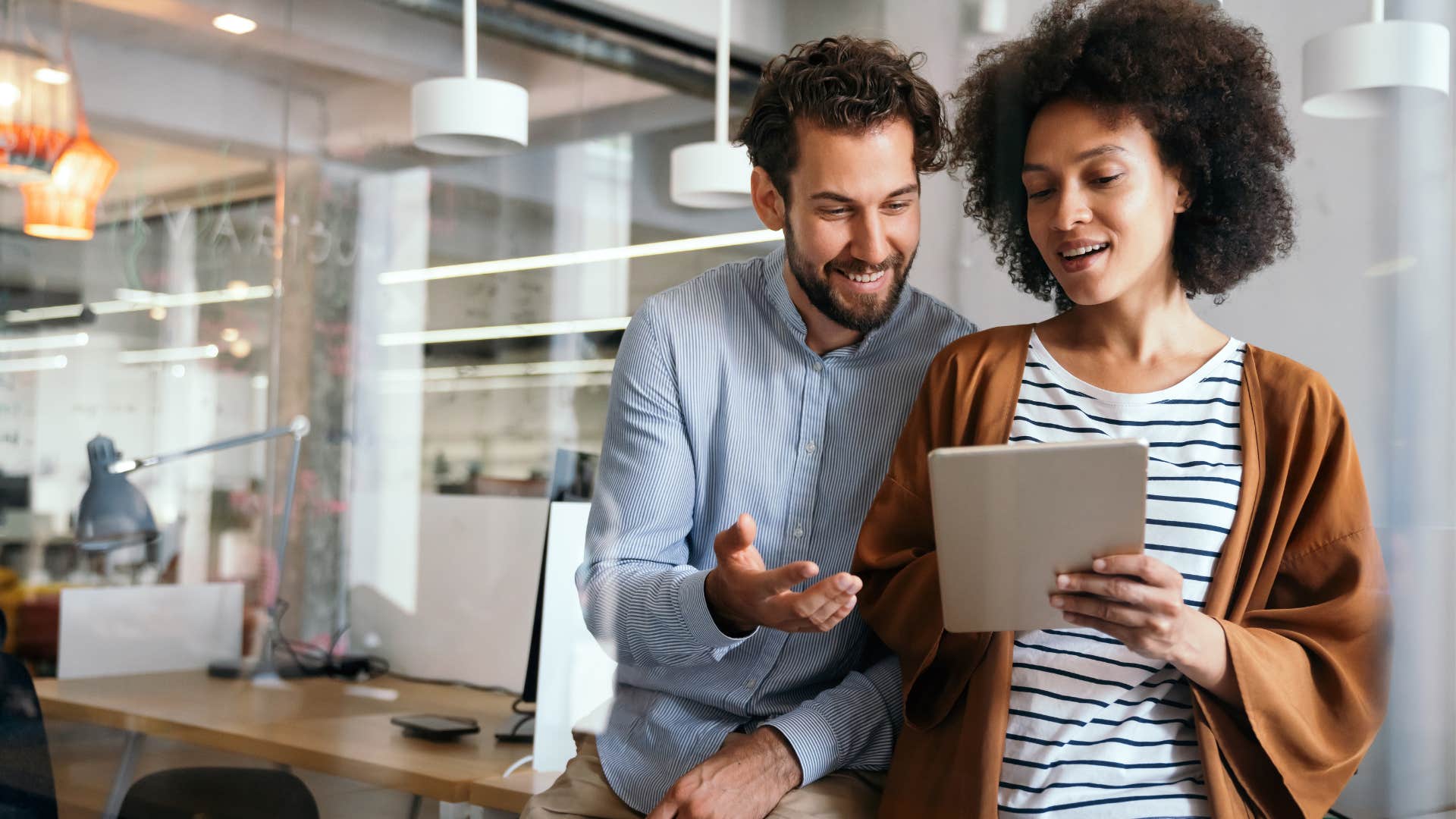 woman seeking attention from co-worker