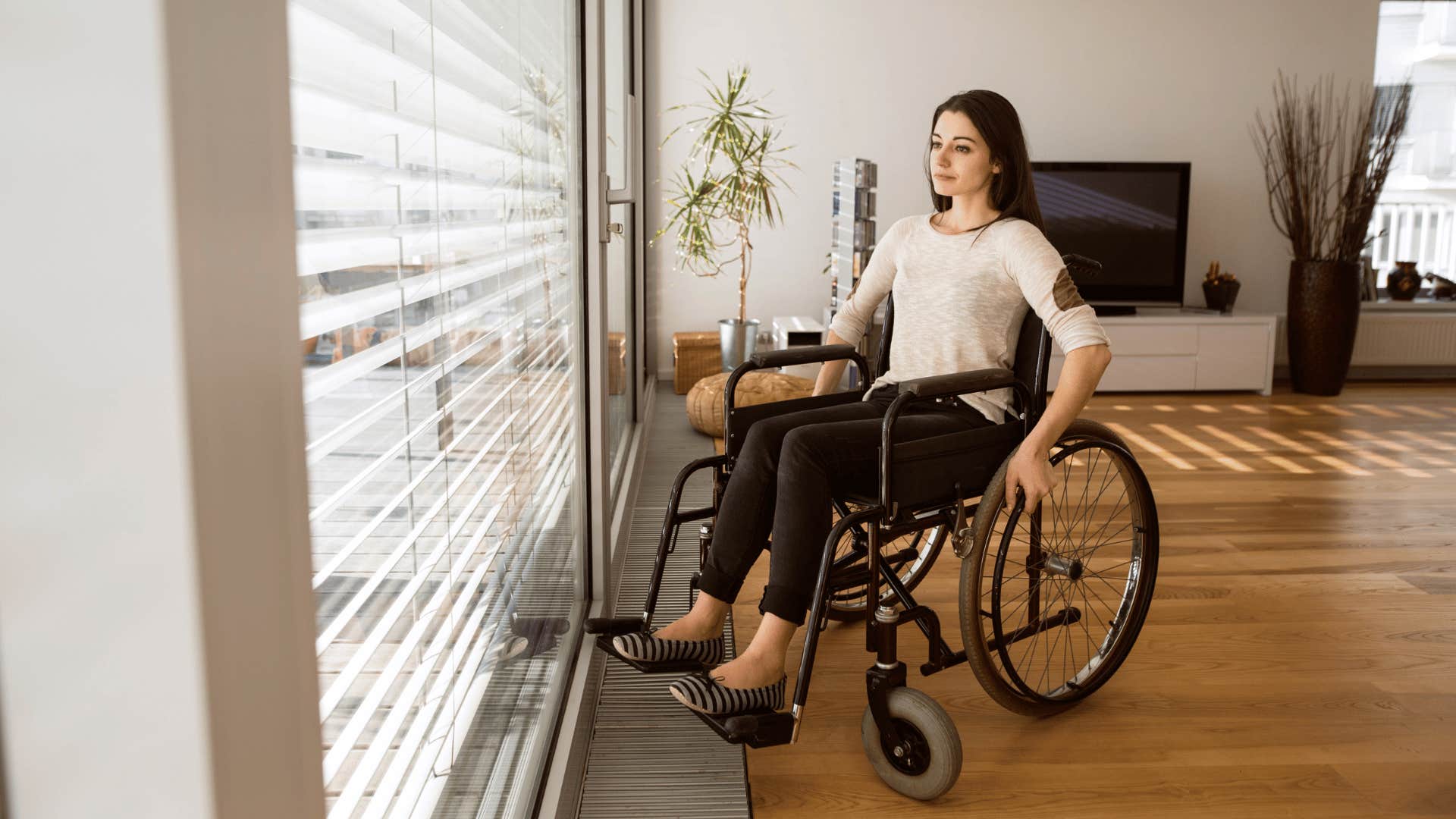 Woman in wheelchair thinks about self-sufficiency