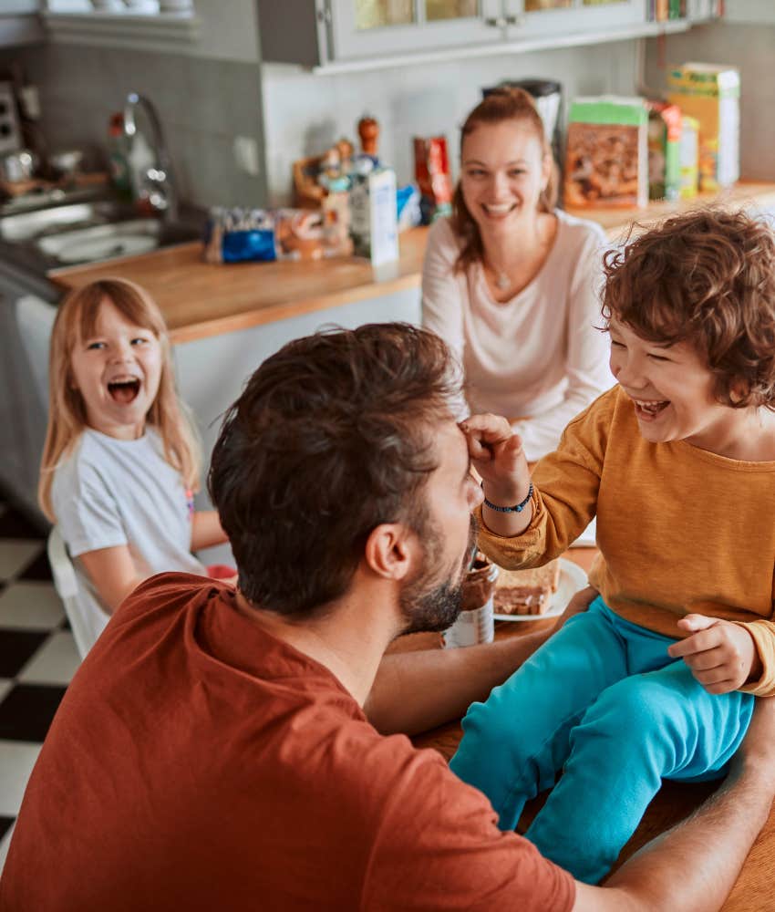 family having fun eating breakfast together