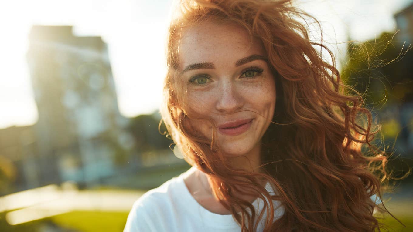 genuine and authentic women smiling with hair flowing