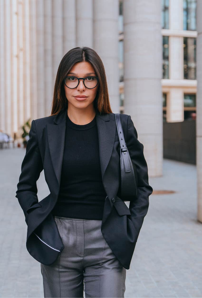 Woman in business clothing feels insecure at work