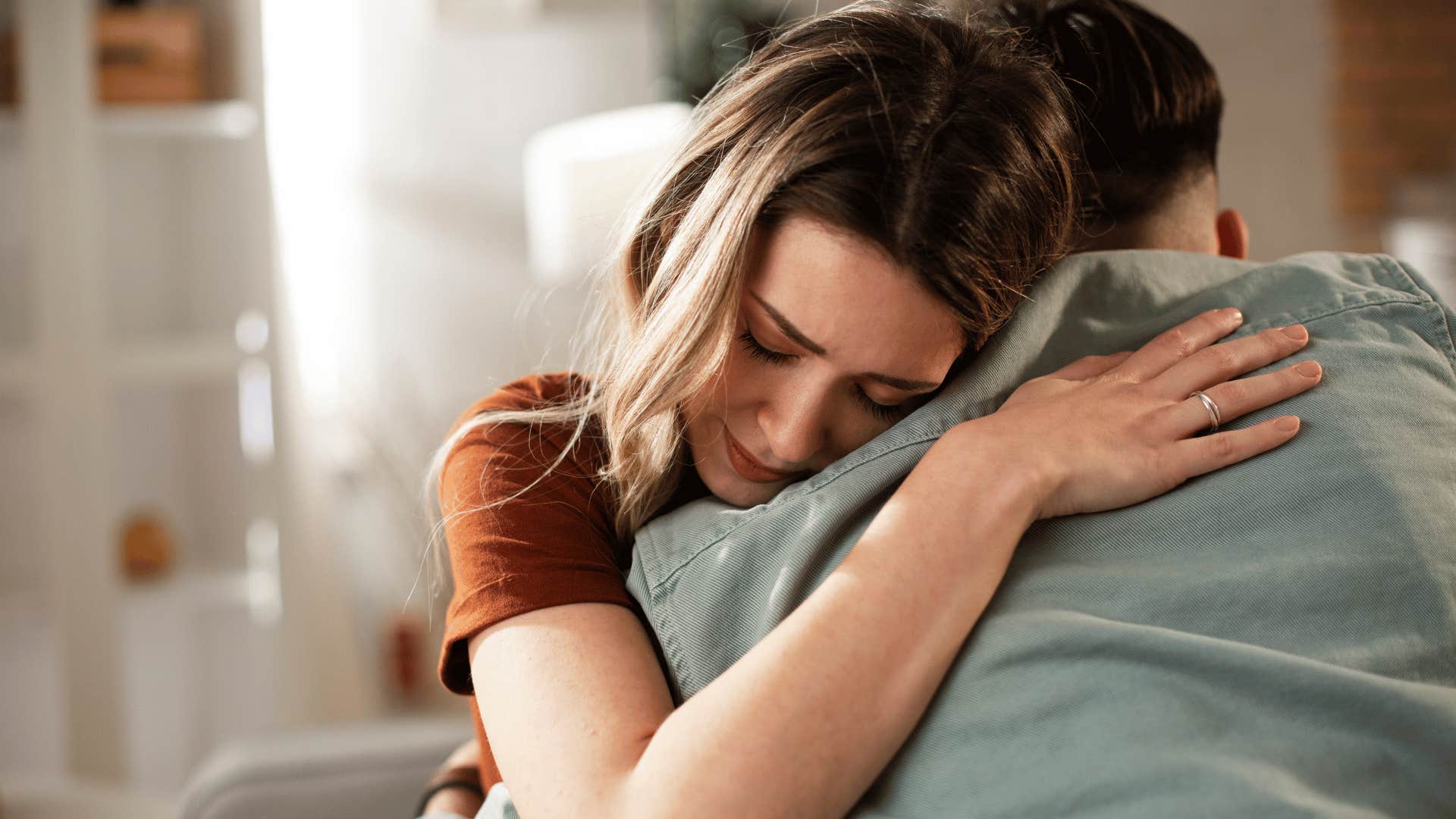 couple hugging because they care about each other's well-being