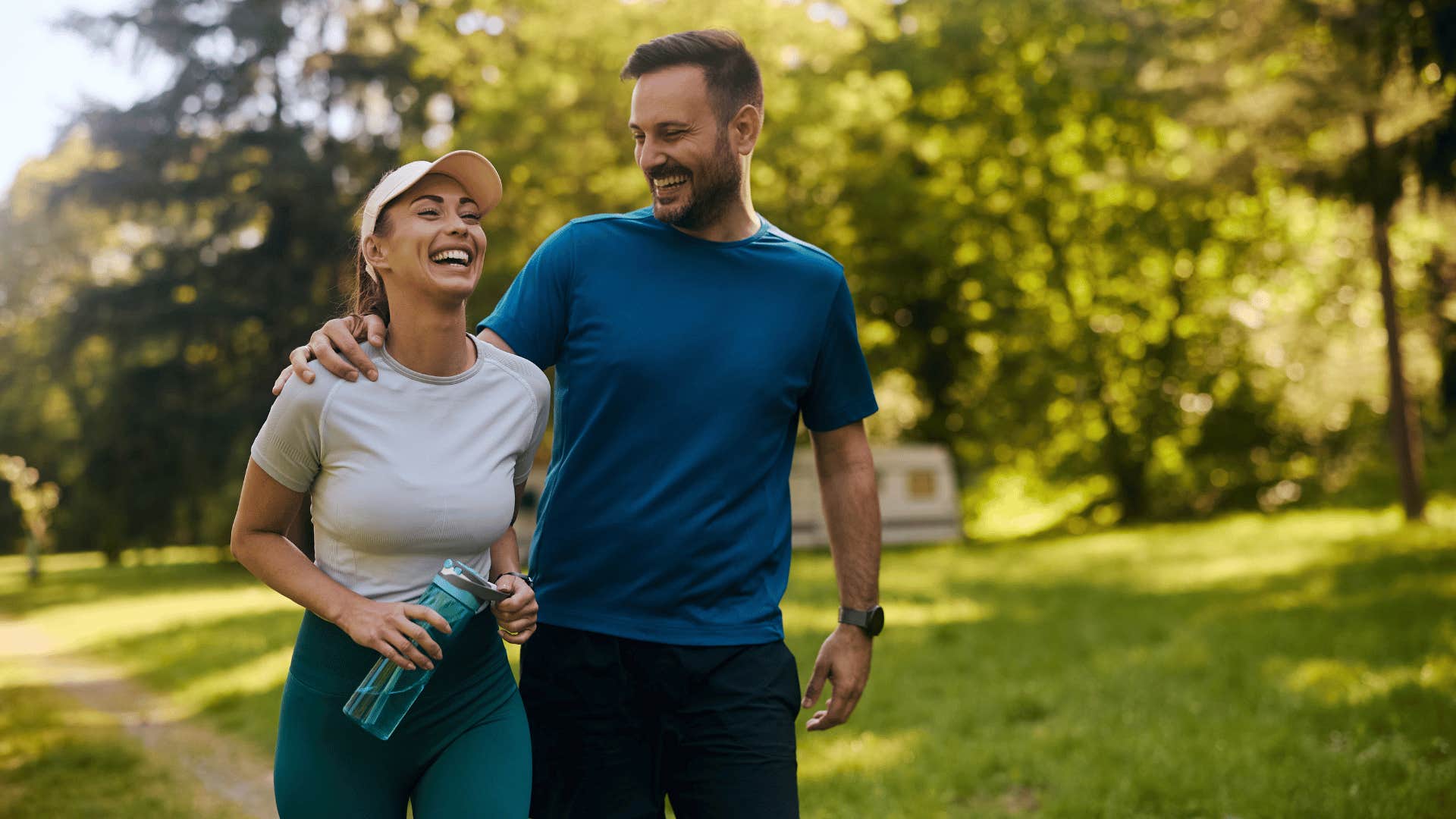 couple exercising and laughing together