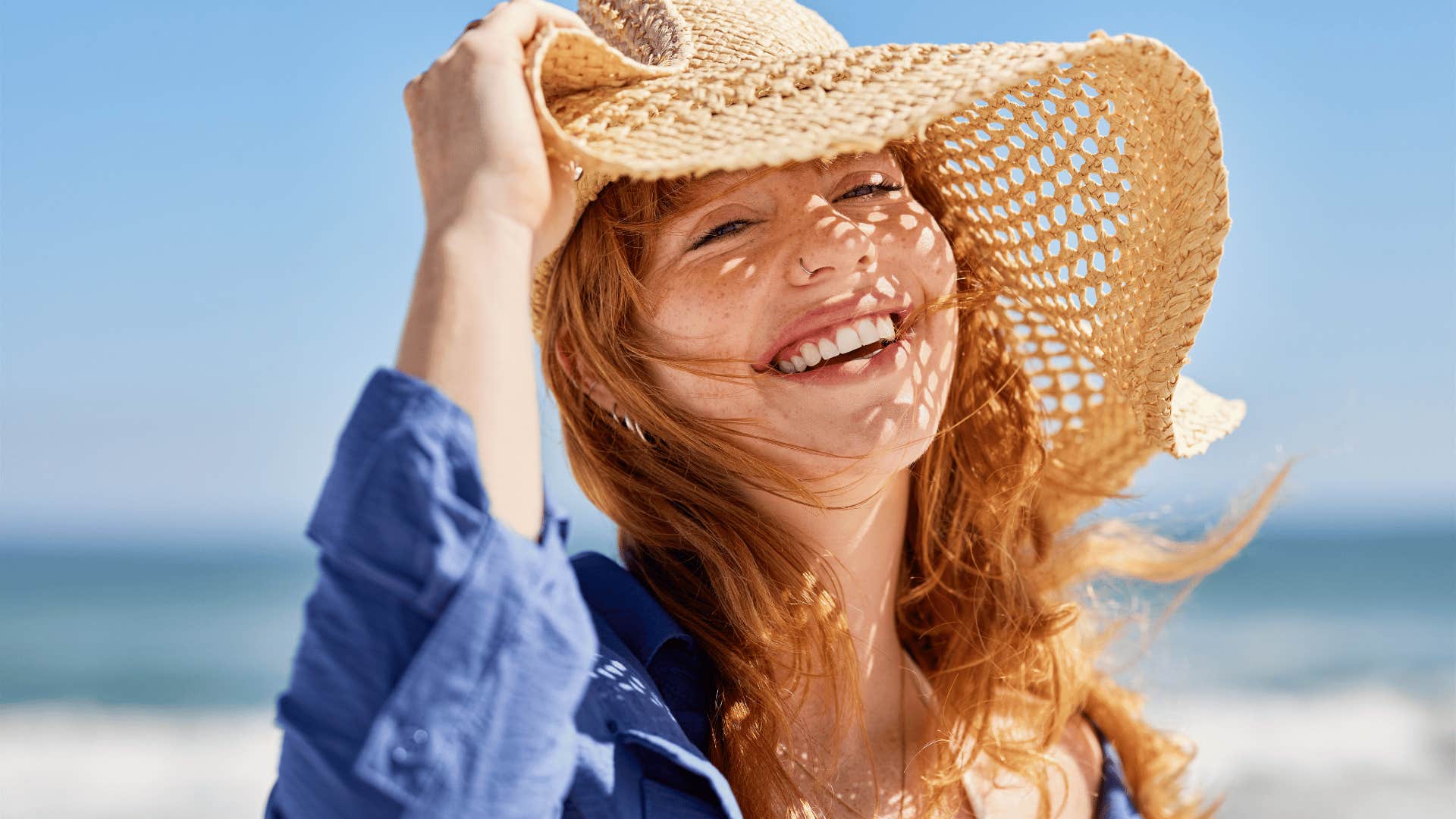 woman smiling on beach