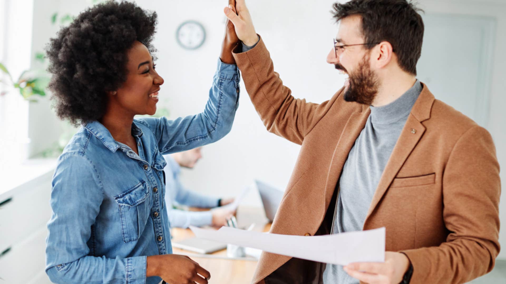 man supporting woman's ambitions