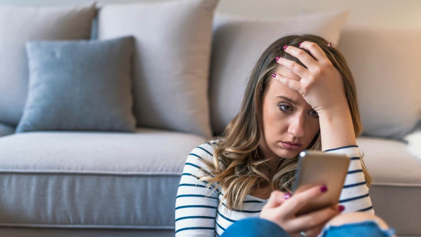 Woman self-inflicting psychological damage with the news